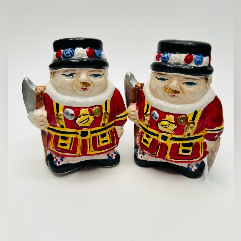 Vintage Toby style salt n pepper shakers ceremonial tower guards of London.